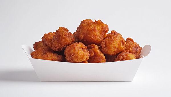Popcorn chicken is the perfect bite-sized snack for kids on the boat.