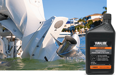 A Yamaha Outboard with a bottle of Yamalube Performance Trim & Tilt Fluid in the foreground.